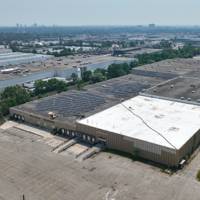 Aerial of 2550 Stanfield Road with front entrance, parking, and shipping doors