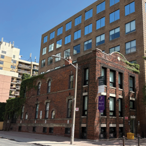 191 John St thumbnail exterior view of the building with brick front and ivy.