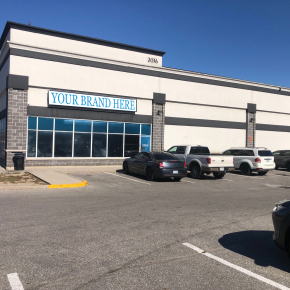2036 Ellesmere Road Building with Mock-Up Signage