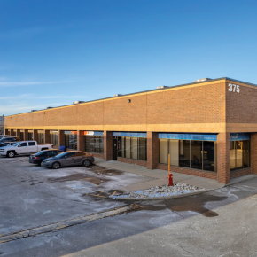 375 Admiral Boulevard building exterior showing main entrance and parking