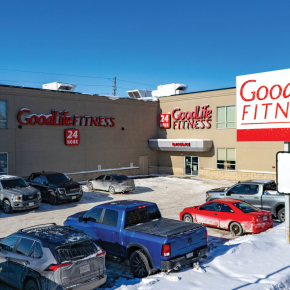 Outside entrance and parking lot of Good Life Fitness building