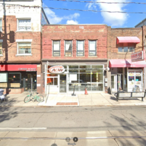 2004 Queen Street E store front showing entrance and street