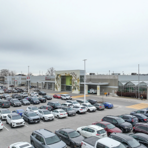 1400 Victoria Street E building exterior showing main entrance and parking