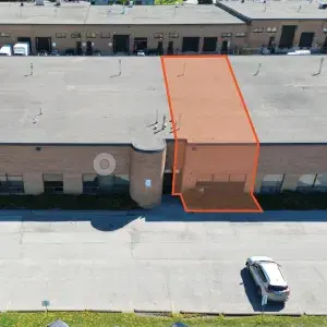 225 Nugget Ave aerial top front view of single storey brick building with orange outline of the available unit 3