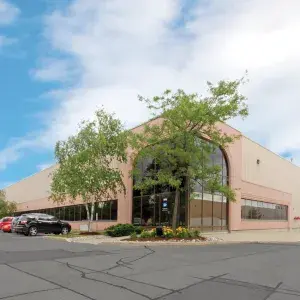 7680 Tranmere Drive front exterior showing driveway and building number 