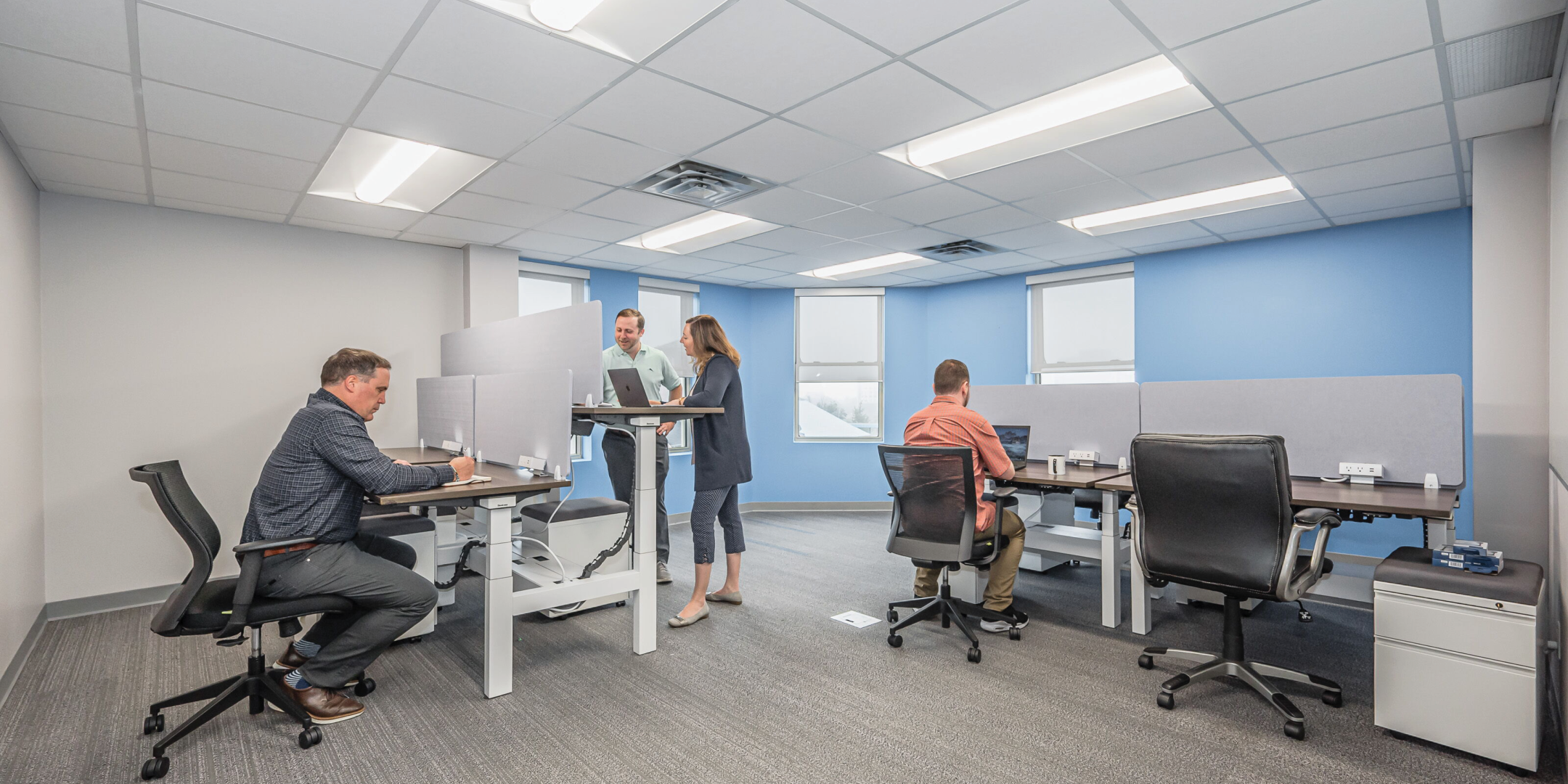 People working in an open office environment