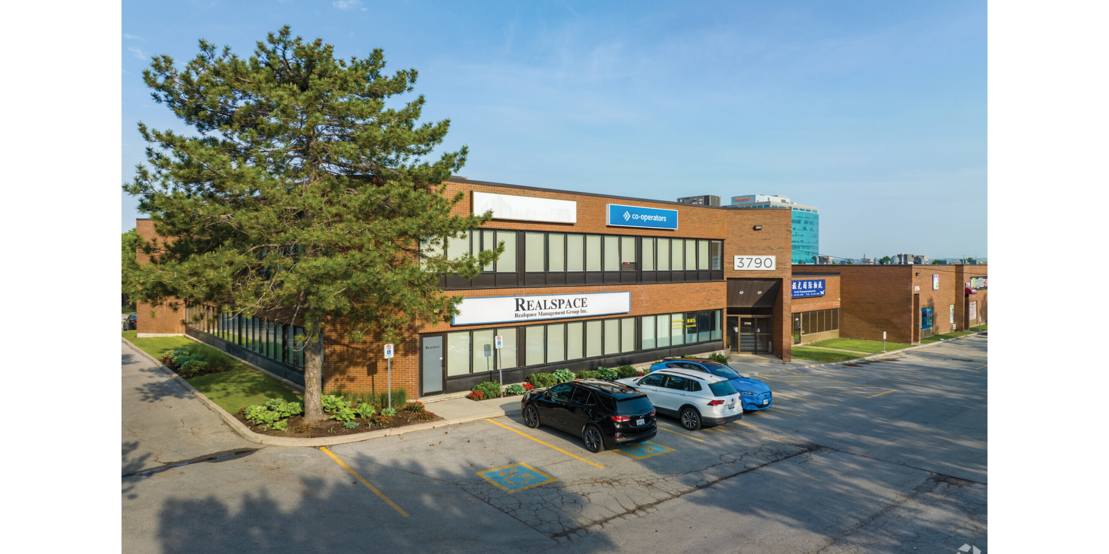 3790 Victoria Park Front of Building with Parking Lot