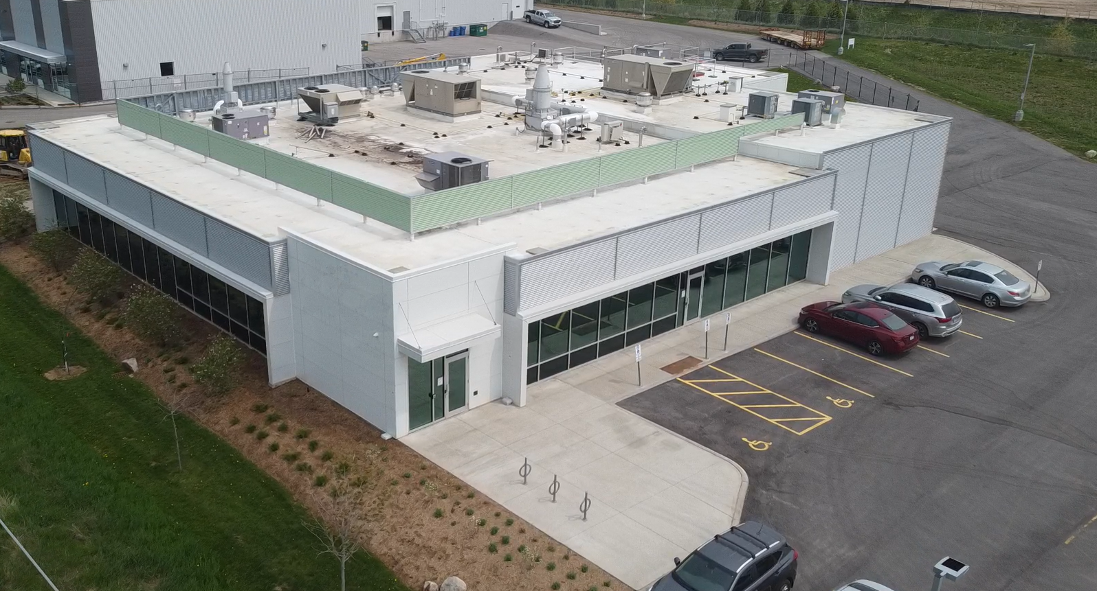 Exterior Building View of 574 Hanlon Creek Blvd Overlooking Building and Roof