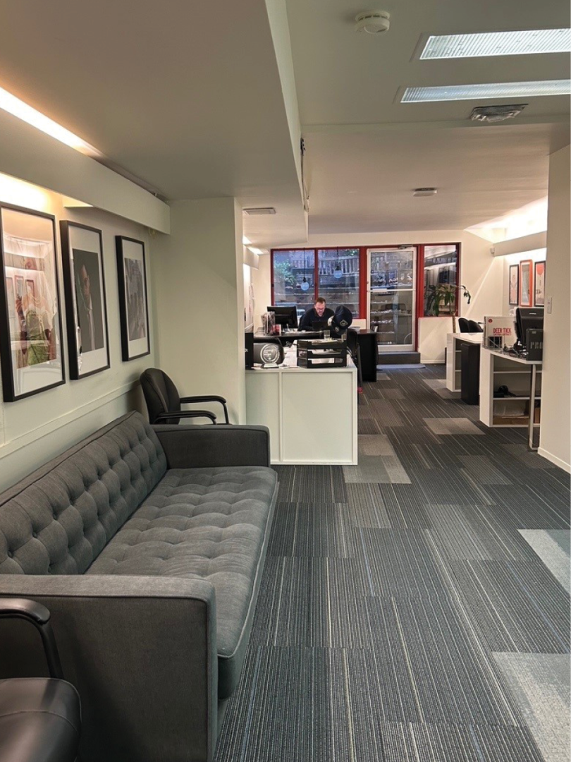 77 Berkeley Street office with grey sofa