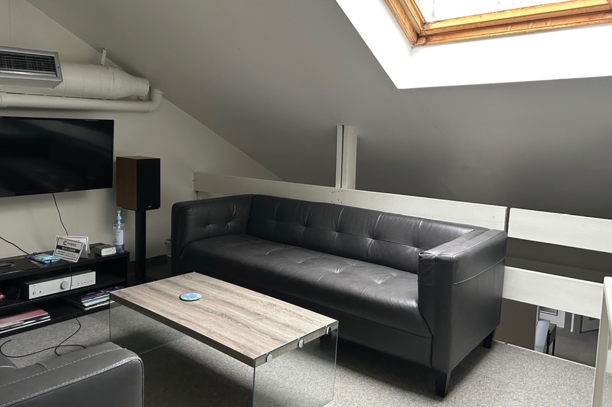 77 Berkeley Street office lounge with sofa and window