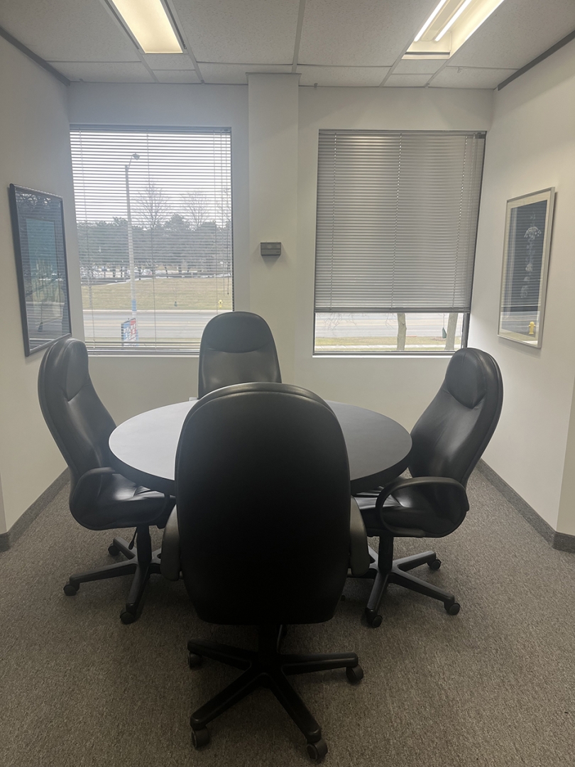 5000 Dufferin St office room with desk and chairs and big window