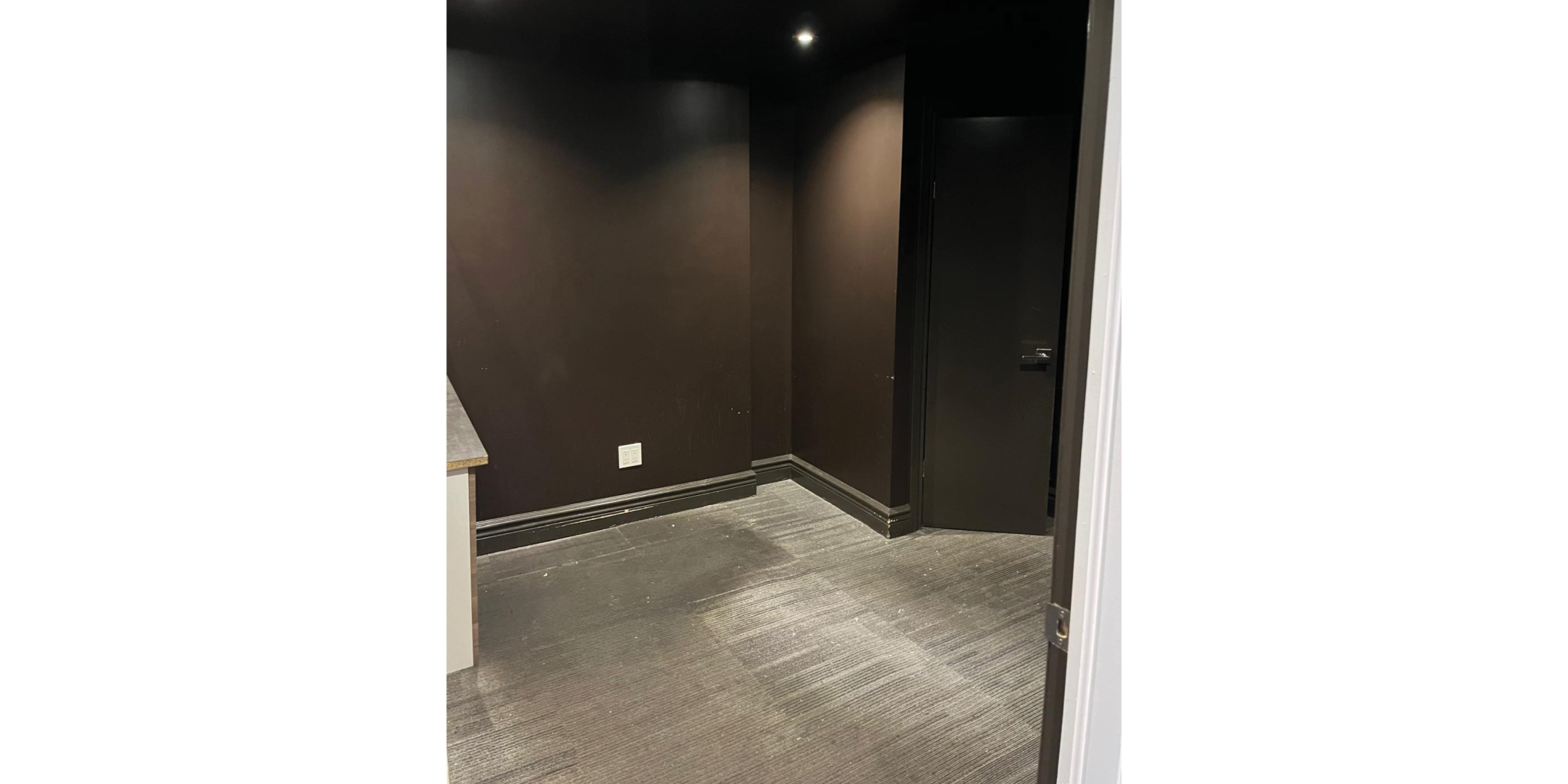 Storage room with brown painted walls