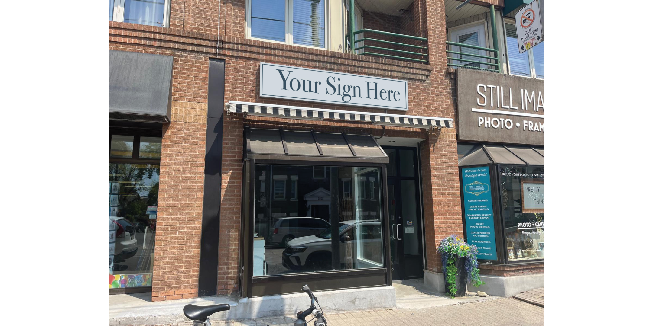 2142 Queen Street E storefront showing the entrance and signange