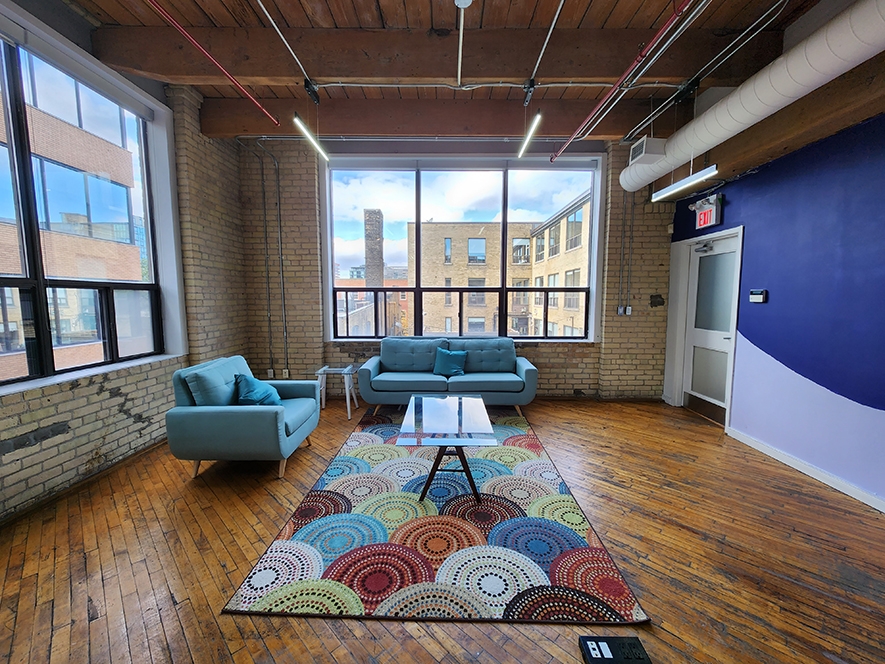 40 Hanna Avenue corner suite meeting roome with desk and sofa