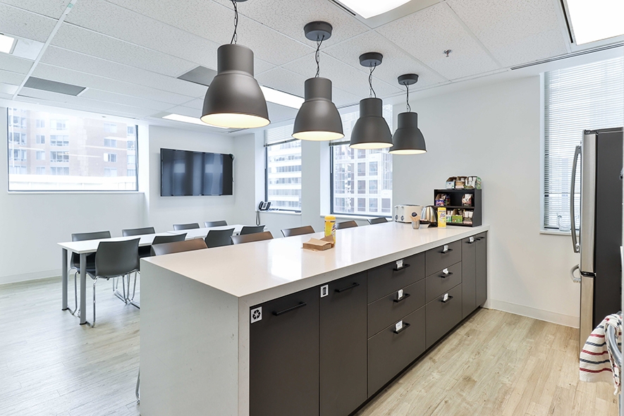 55 York Street kitchen and dining area with cabinets and table