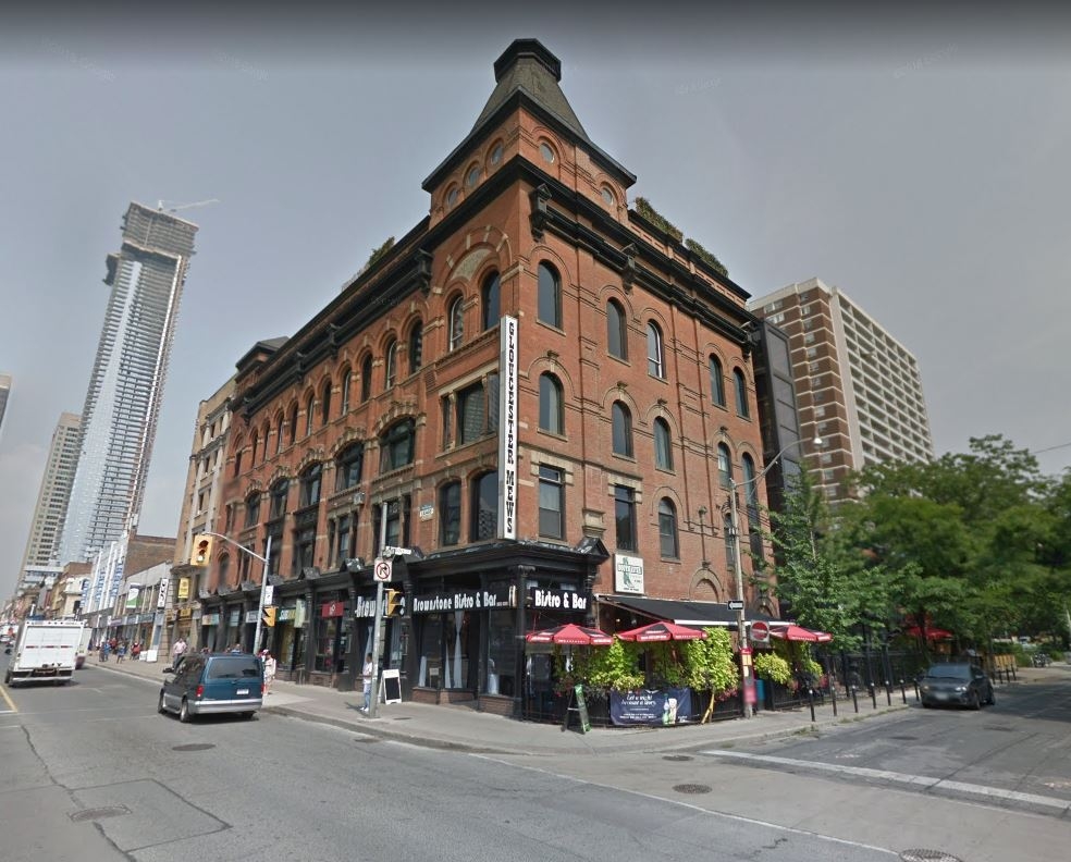 613 Yonge St building view with retail stores