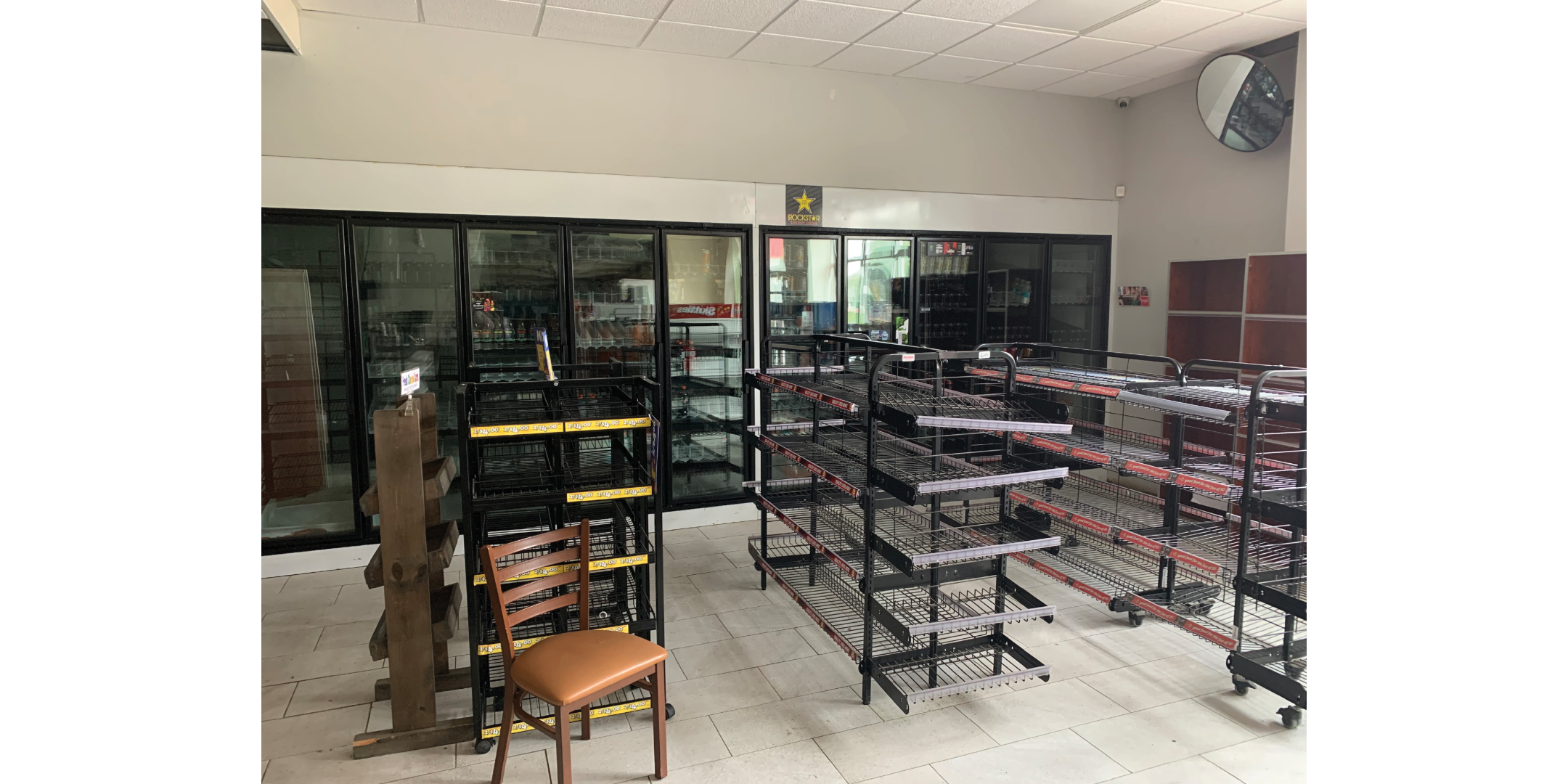 219 Rorke Avenue Interior Convenience Store shelving and refrigerators