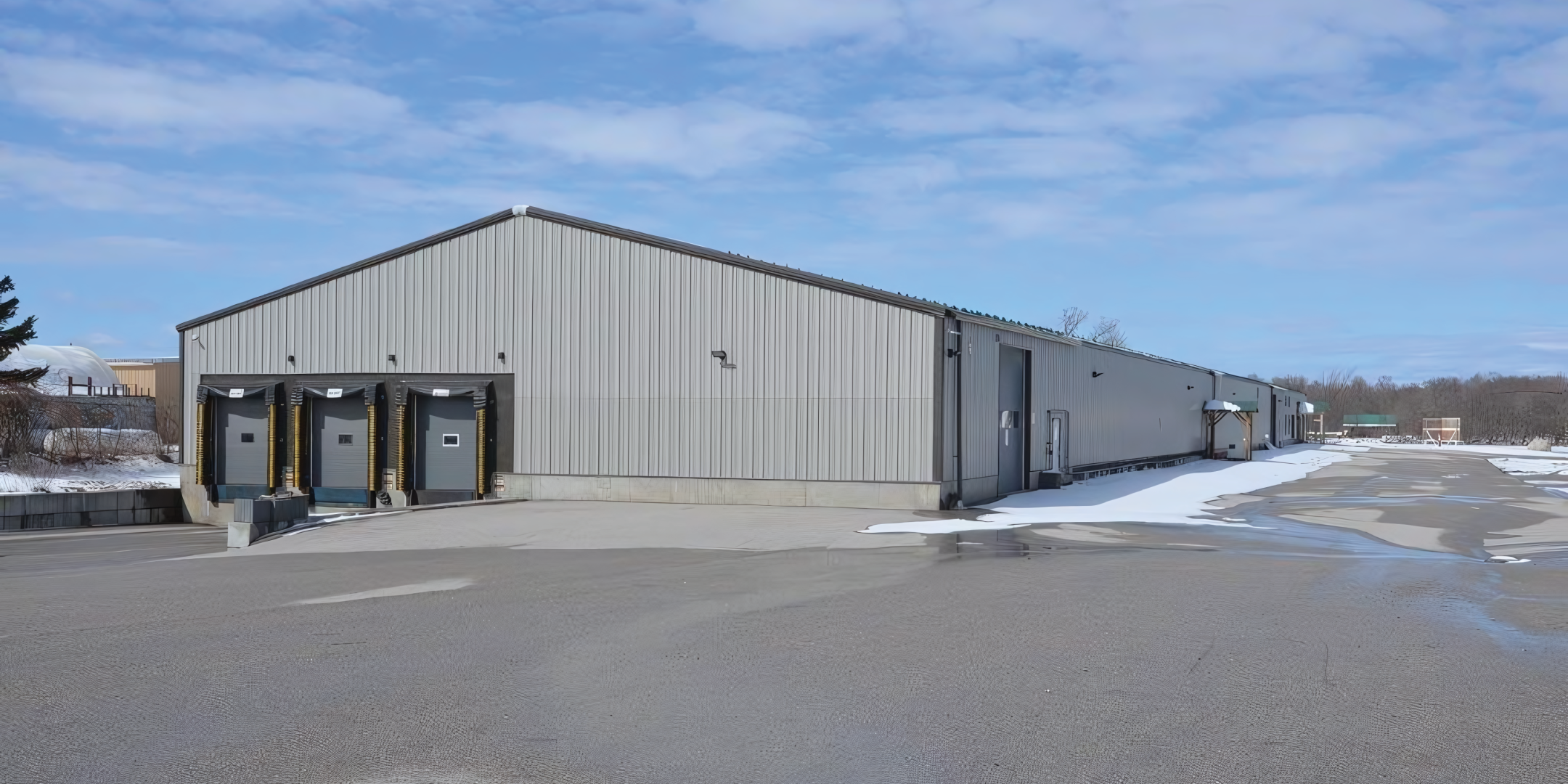 2267 15-16 Sideroad E building exterior with truck doors