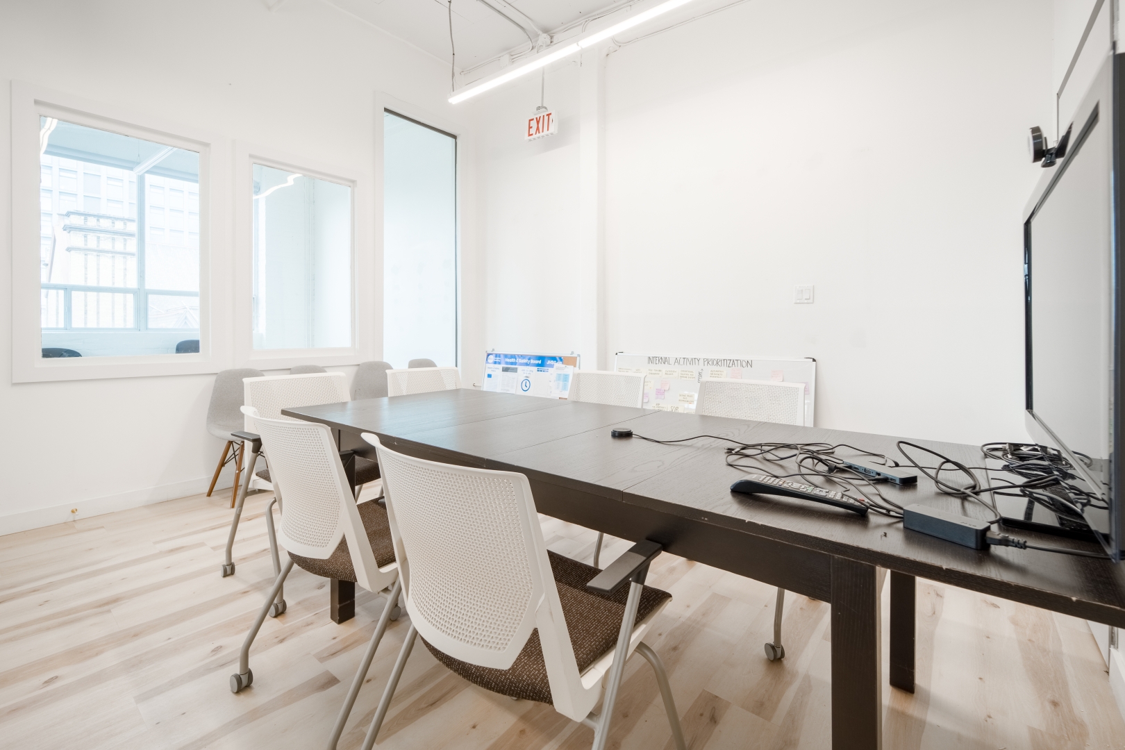 720 Bathurst St meeting room with desk chairs and window