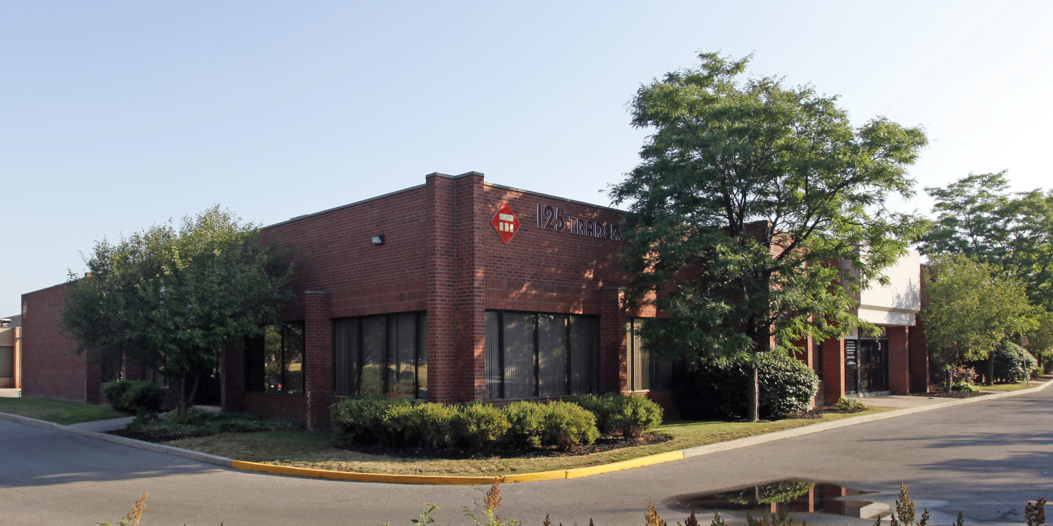 125 Traders Boulevard E exterior with signage and main entrance