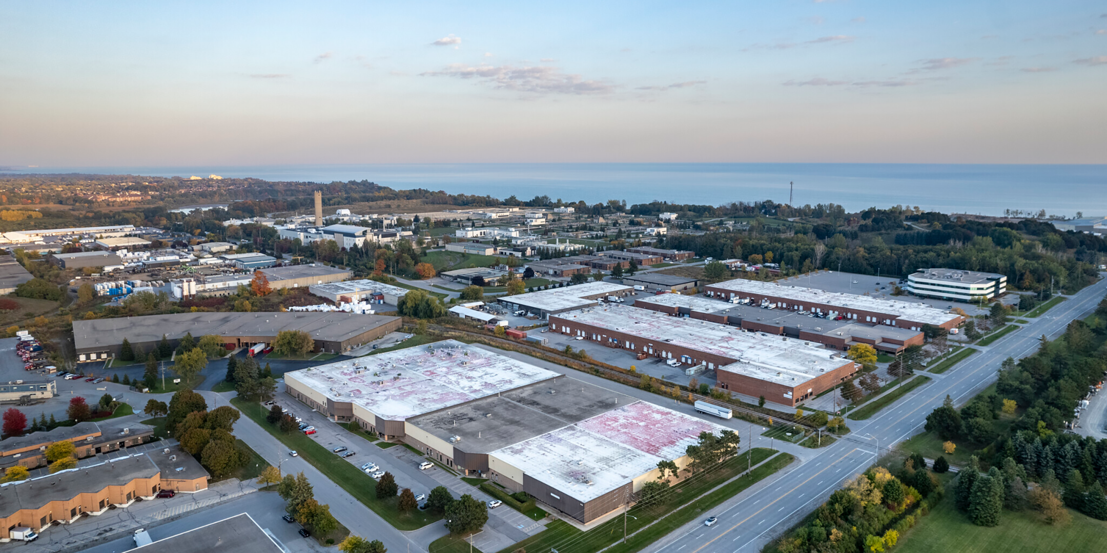 Aerial of 1725 McPherson Court with main entrance, parking, and access to major roads