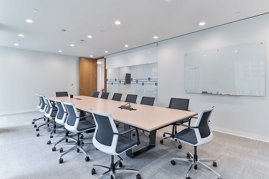 181 Bay Street Boardroom with whiteboard overlooking the table and chairs