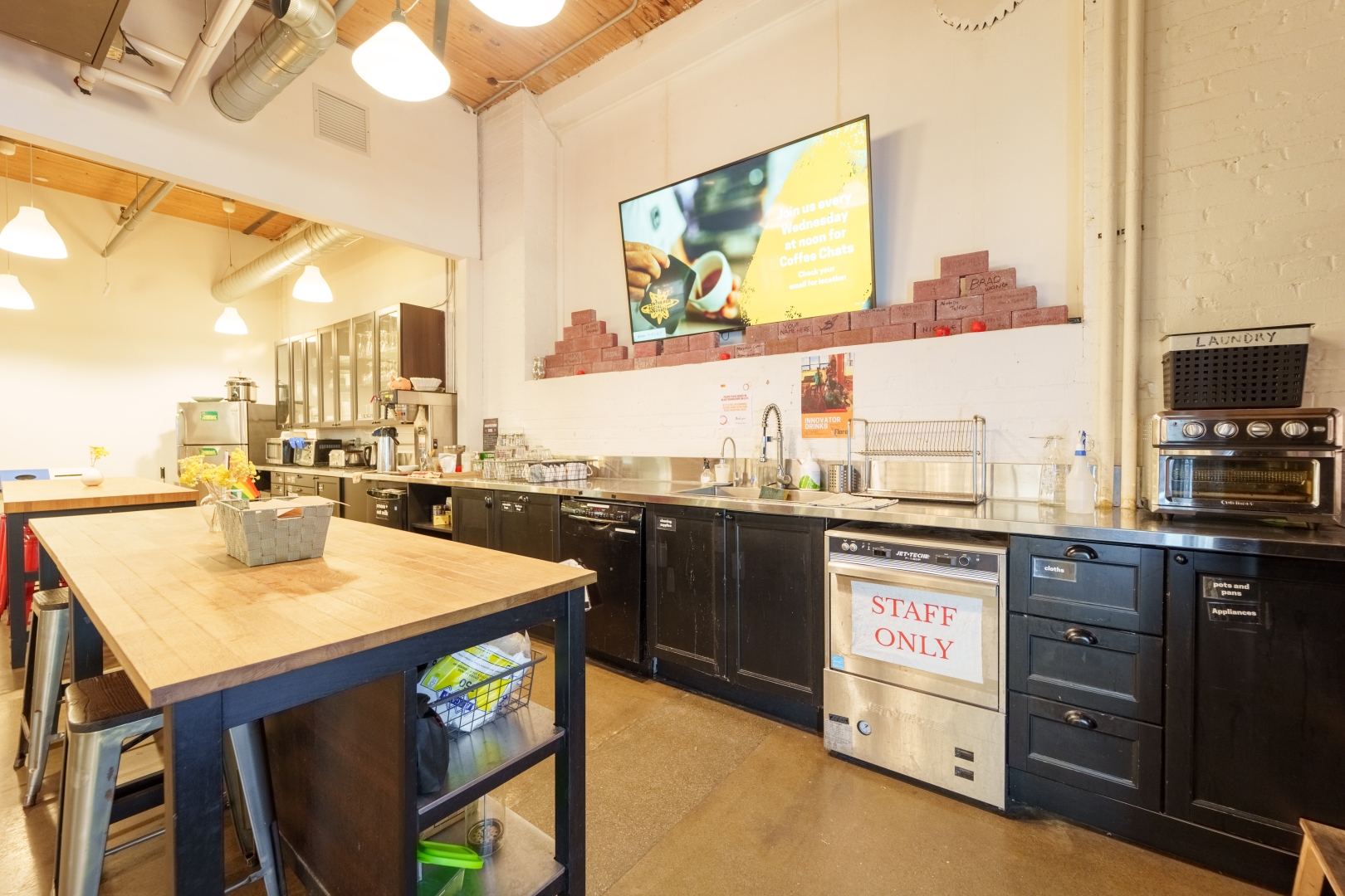 192 Spadina Avenue Community Kitchen with TV and kithchen appliances on Main Floor
