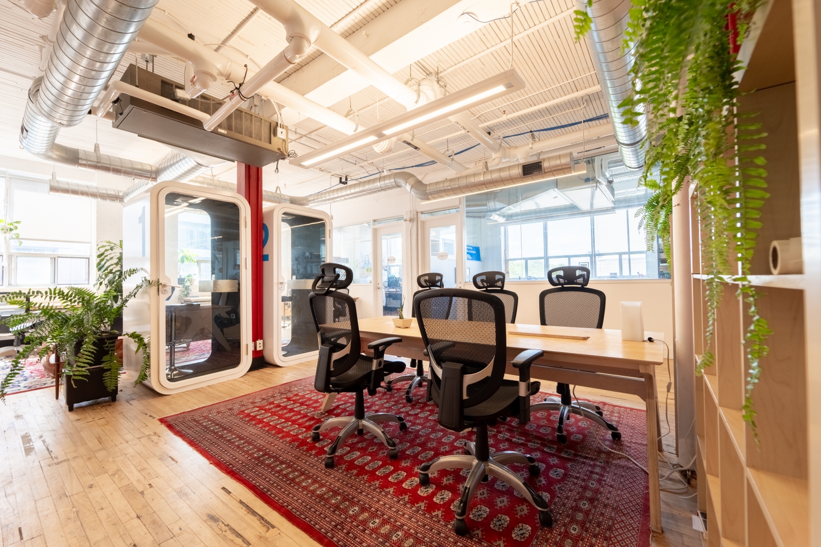 192 Spadina Avenue phone booths with meeting space by the side