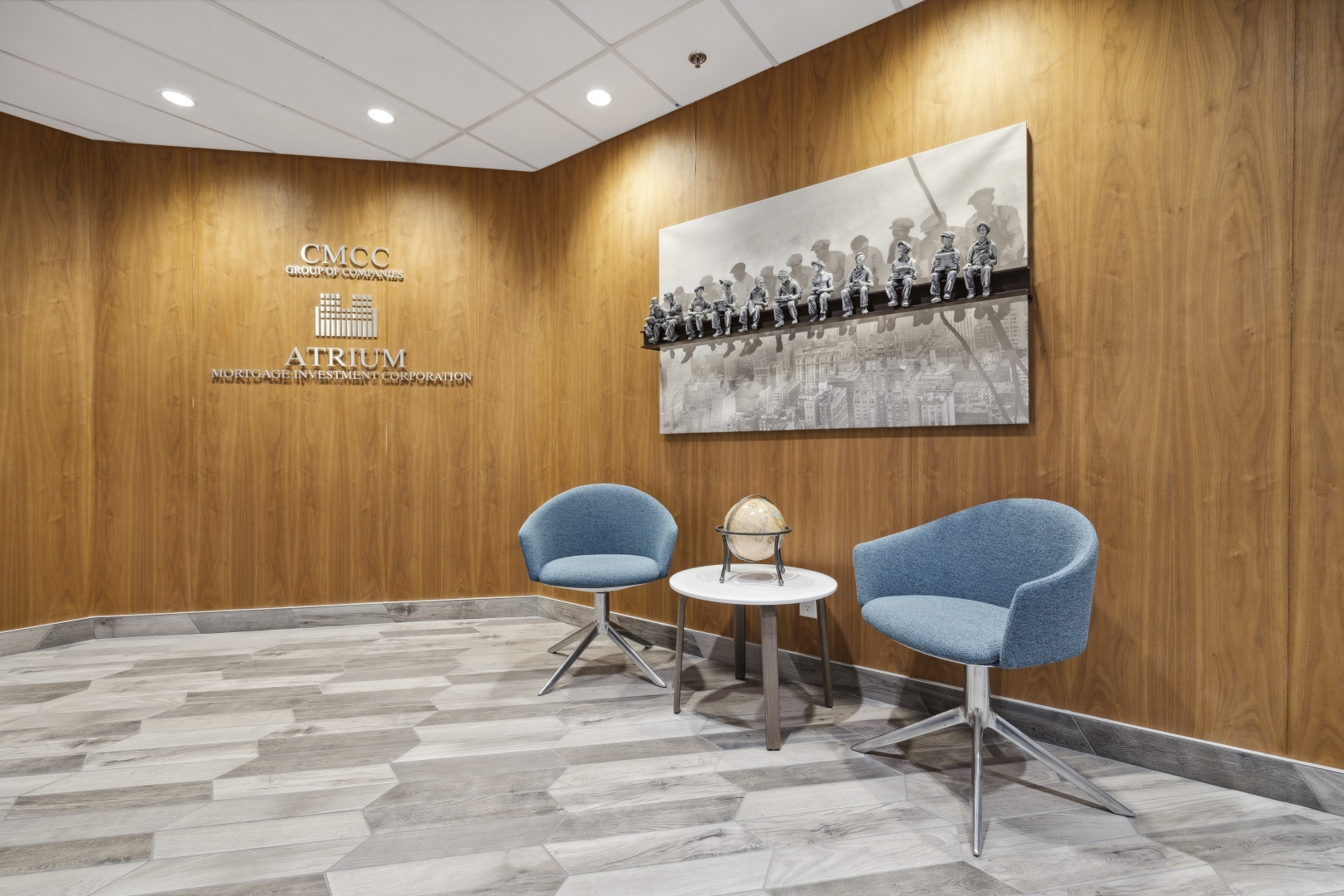 20 Adelaide St suite 900 office reception area with a coffee table and two blue chairs