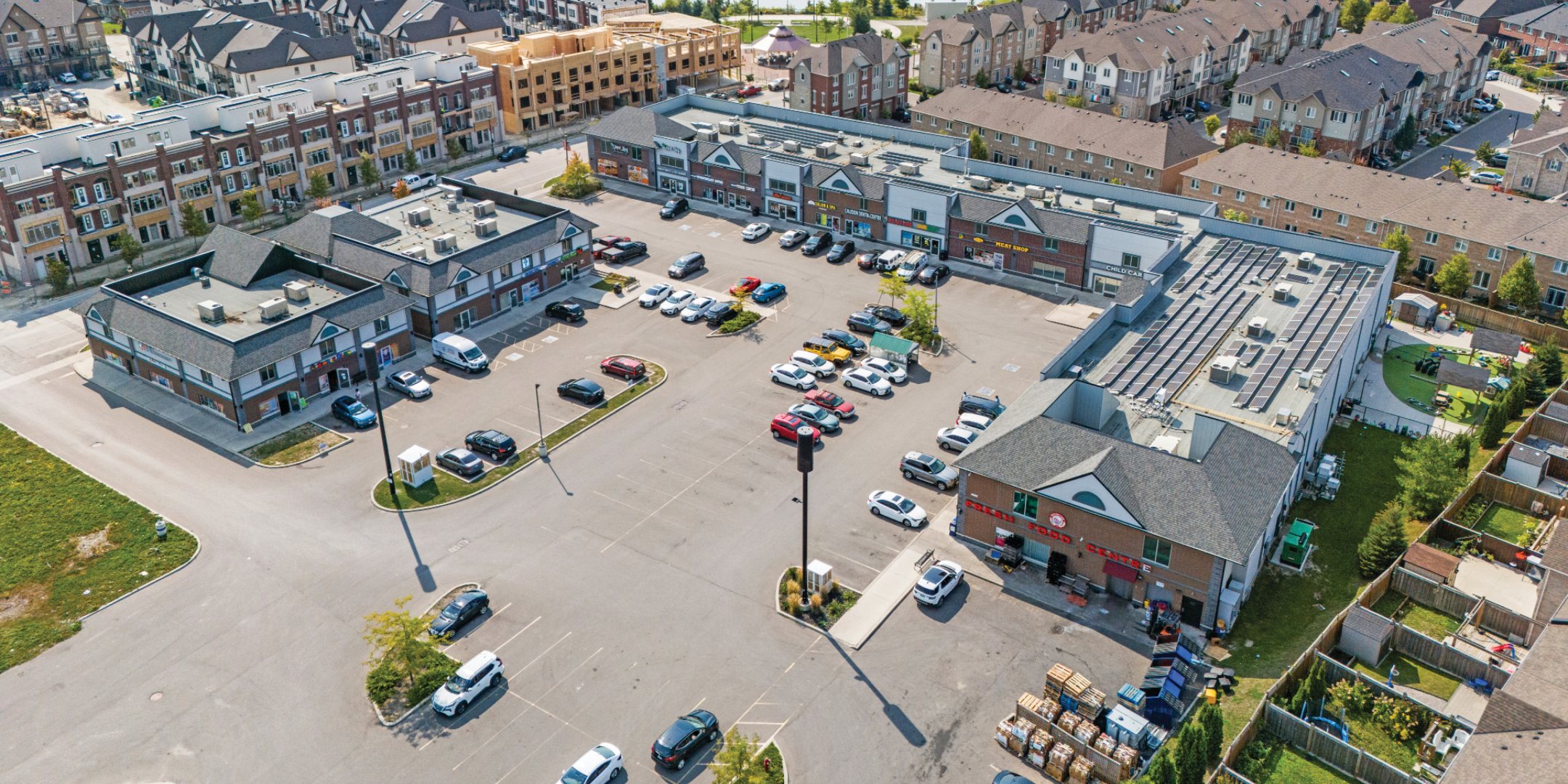 Aerial view of 12550, 12560, 12570 Kennedy Road showing the plaza and Parking