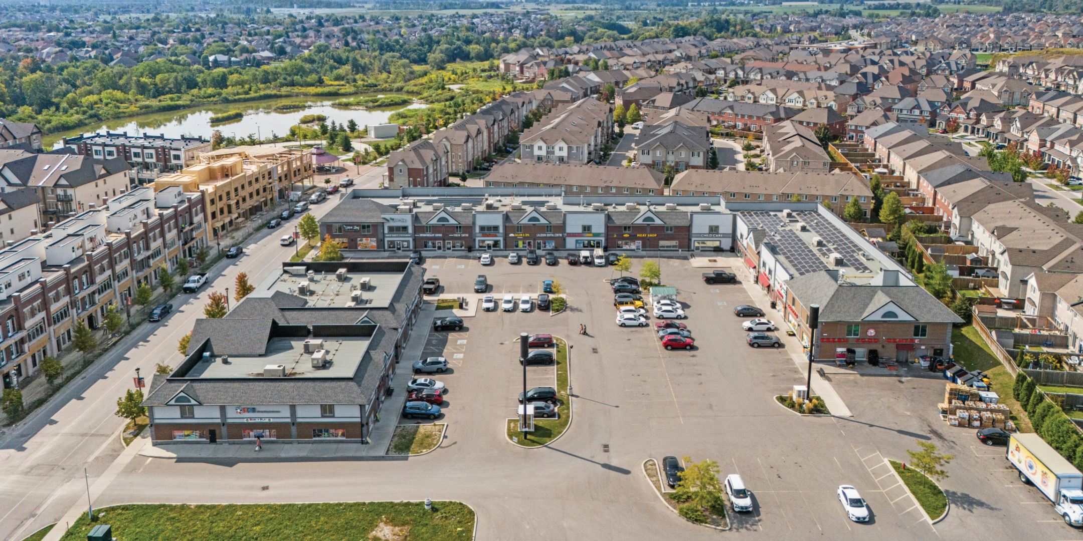 Aerial view of 12550, 12560, 12570 Kennedy Road showing the plaza and Parking