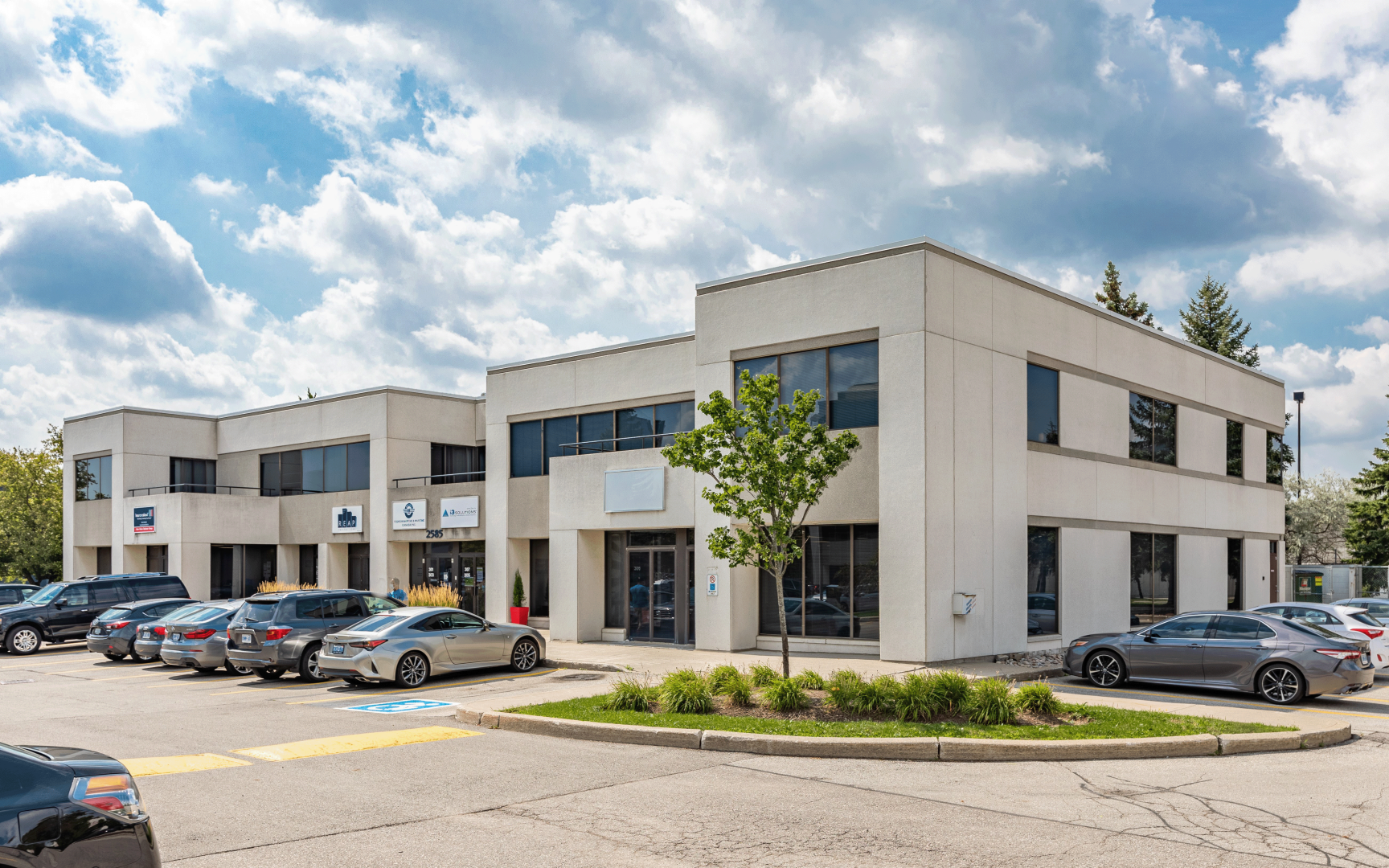2585-2595 Skymark Ave Building with view of the front parking