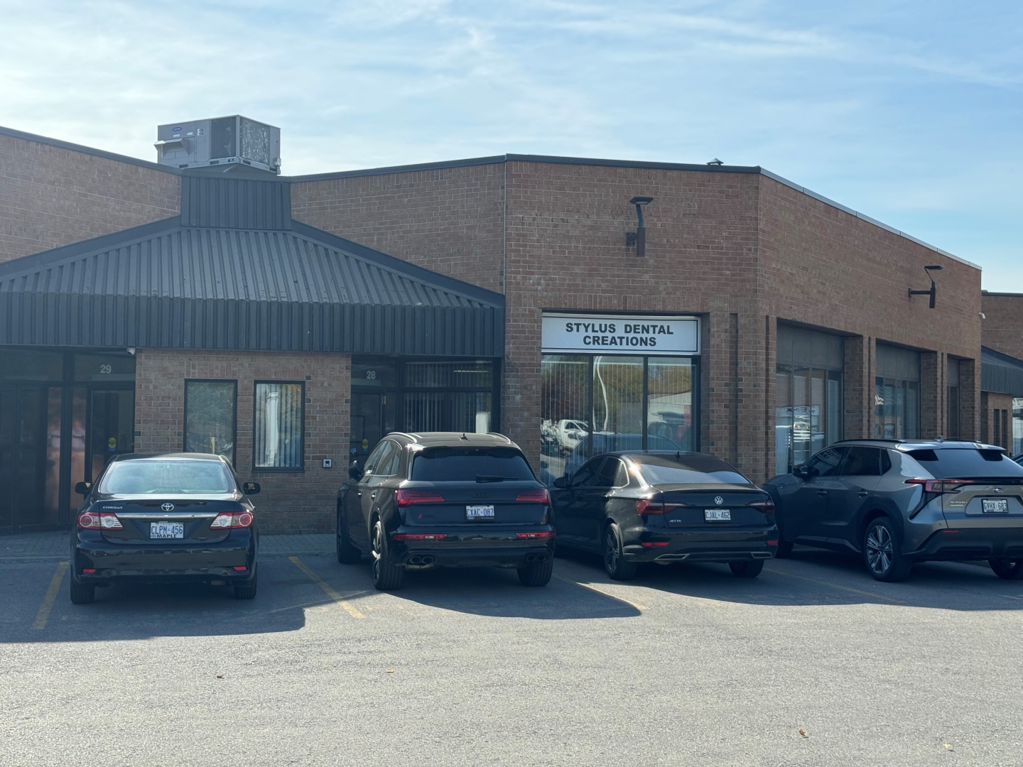 View of 588 Edward Avenue with parking lot area