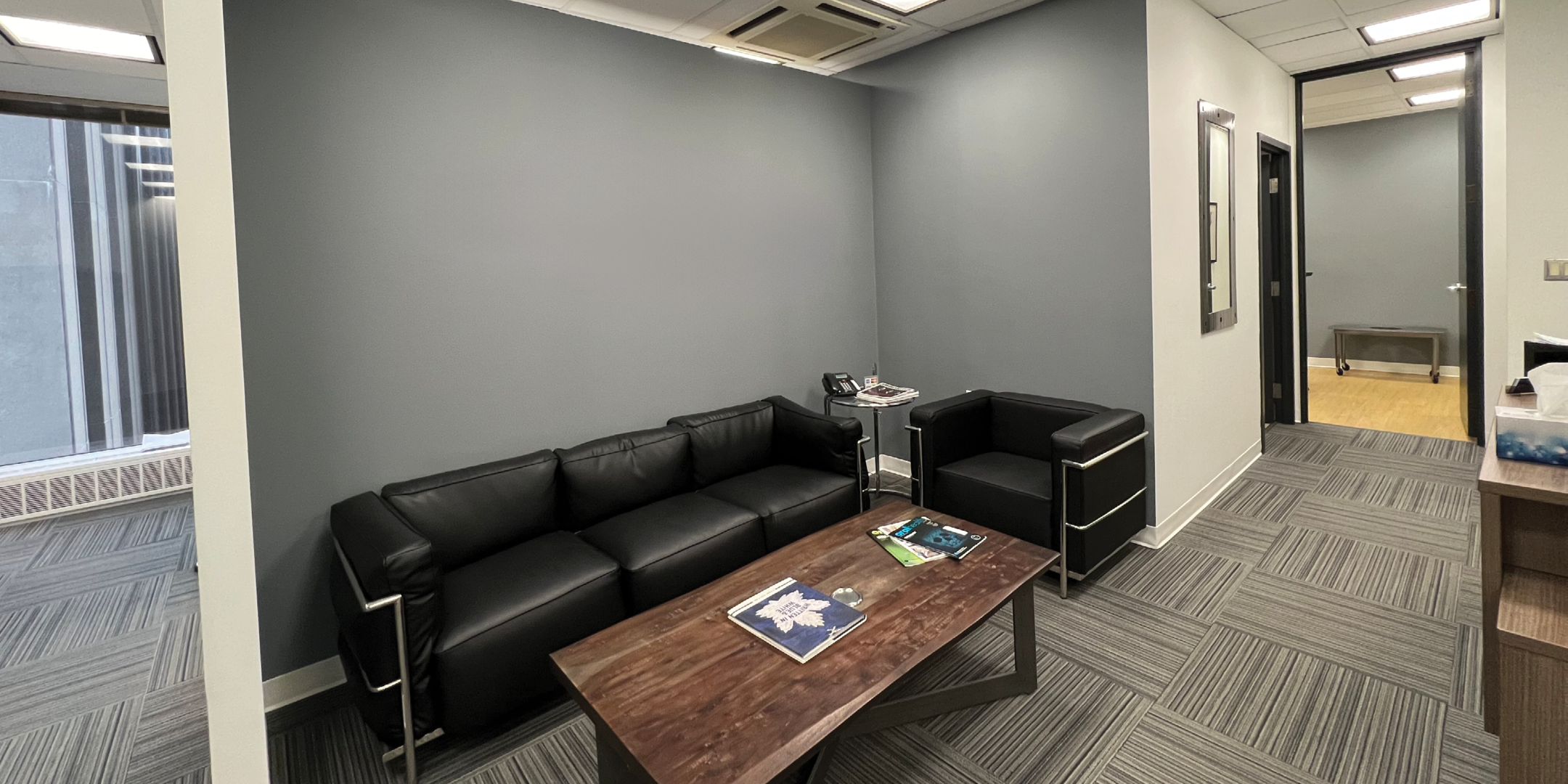 65 Queen Street West reception area with sofa
