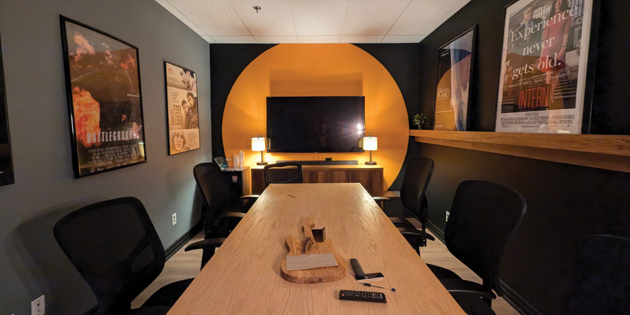 793 Pharmacy Avenue Boardoom with large table, chairs and TV