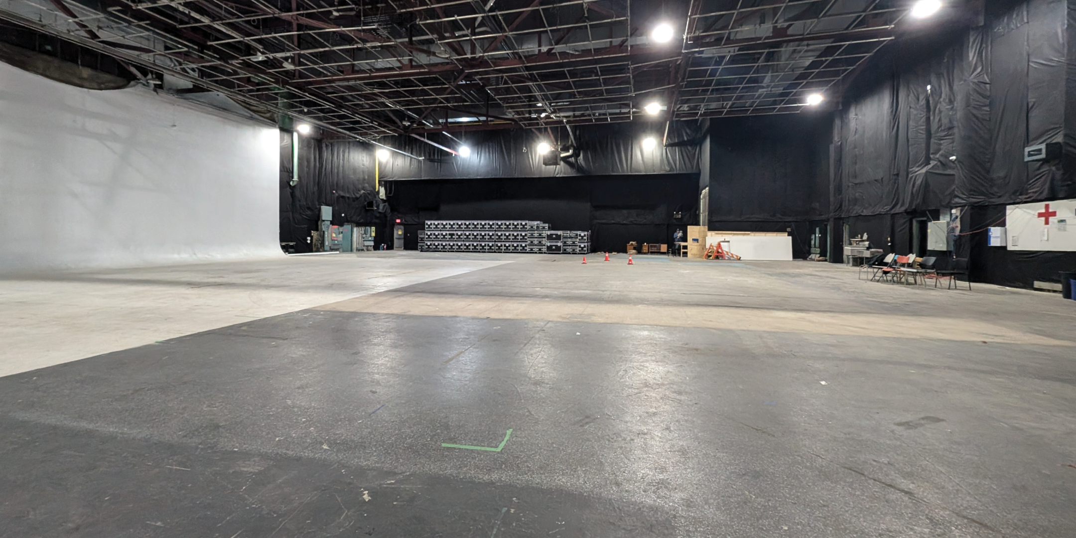 793 Pharmacy Avenue Large Film Area with white walls and bright lights