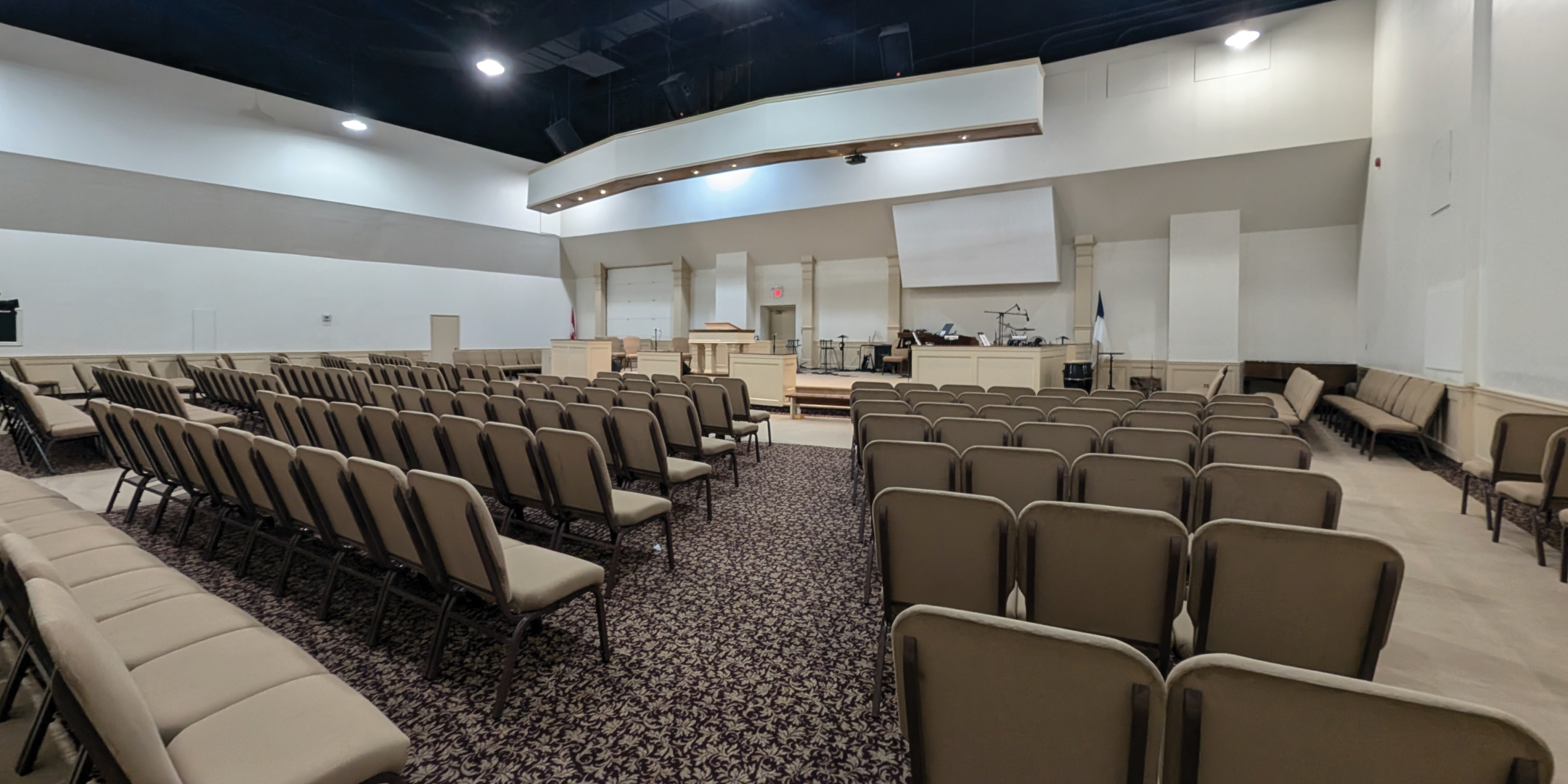 793 Pharmacy Avenue Theatre Area with chairs and projector screen