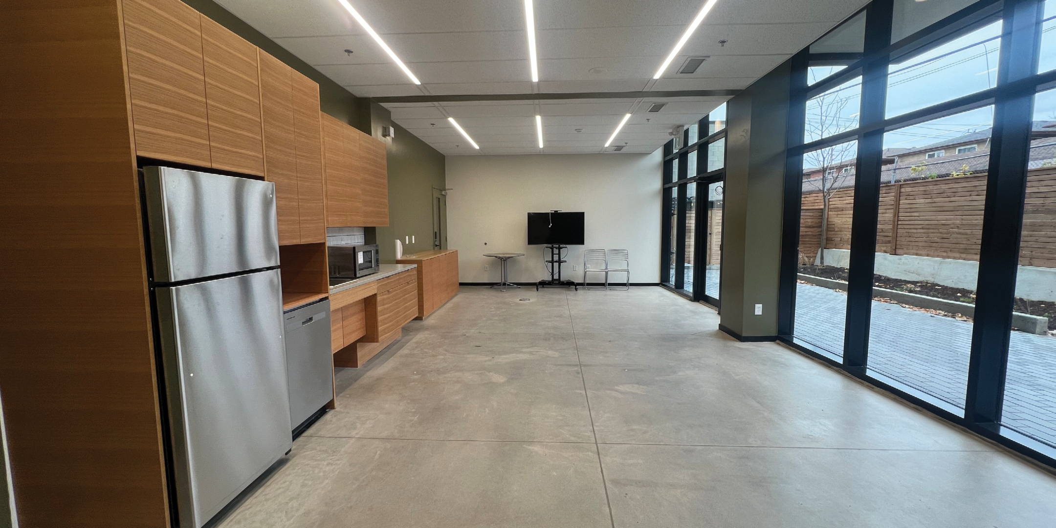300 Geary kitchen and cafe area with big windows and garden view