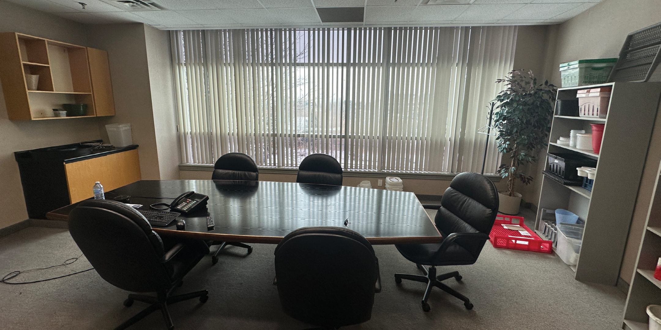 51 Four Valley Drive Boardroom Area with large table, chairs and window