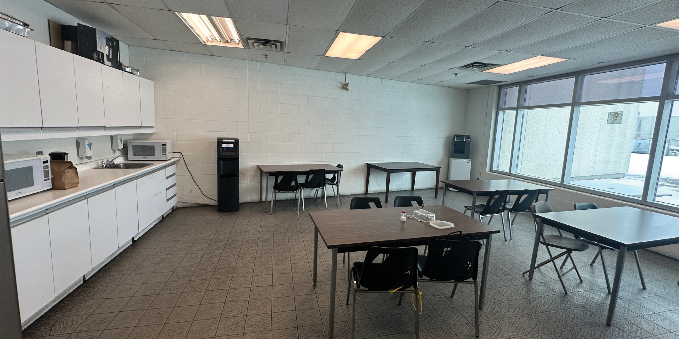 51 Four Valley Drive Lunch Area with Kitchenette, tables, chairs and large window