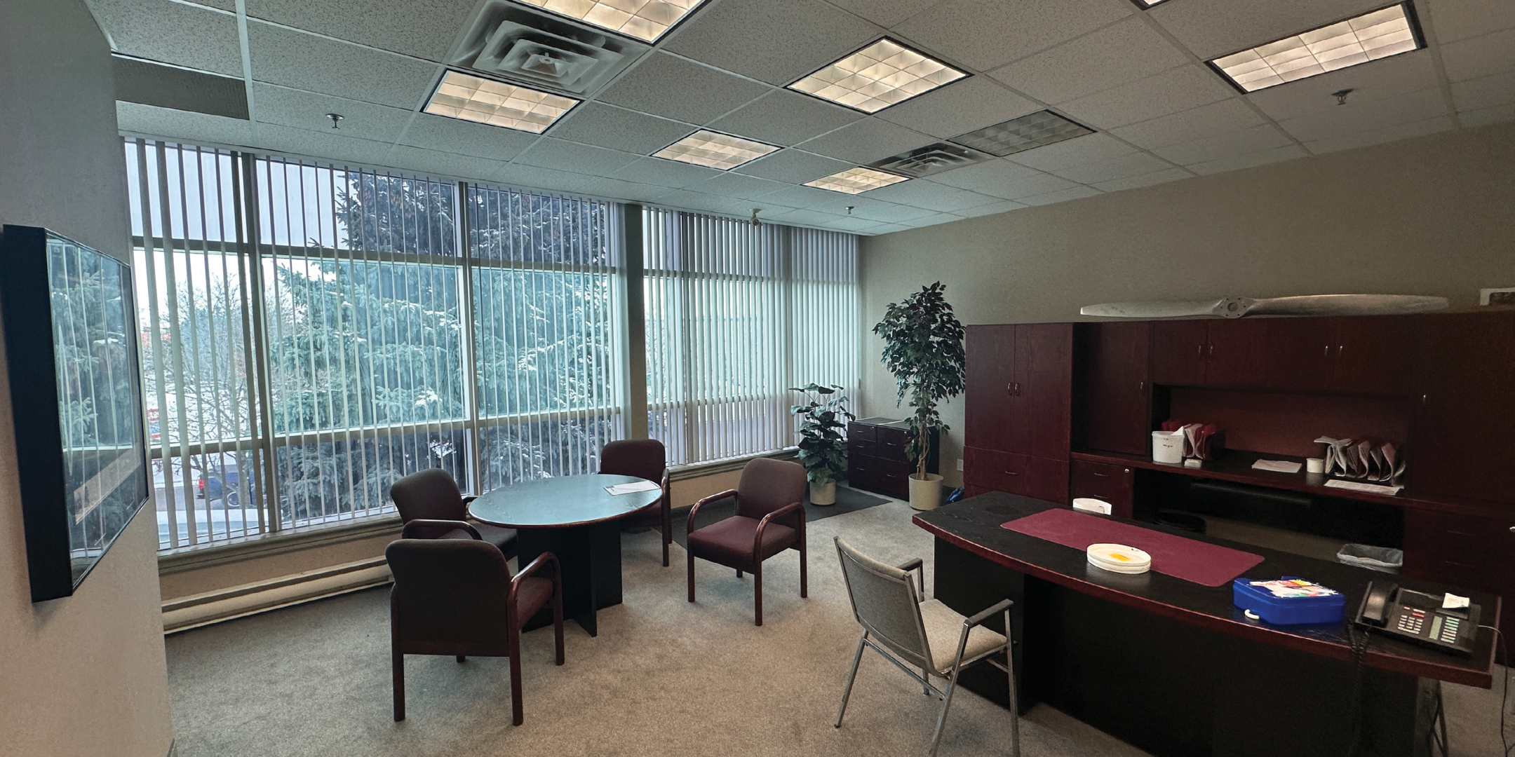51 Four Valley Drive Office with large desk, table desk, chairs and large floor to ceiling windows