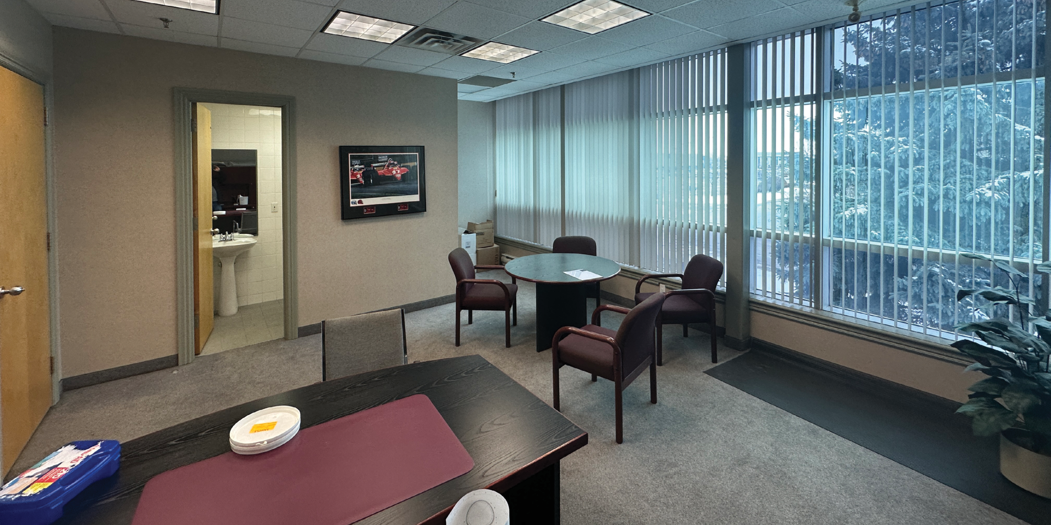 51 Four Valley Drive Office Area with table desk, chairs and large floor to ceiling windows