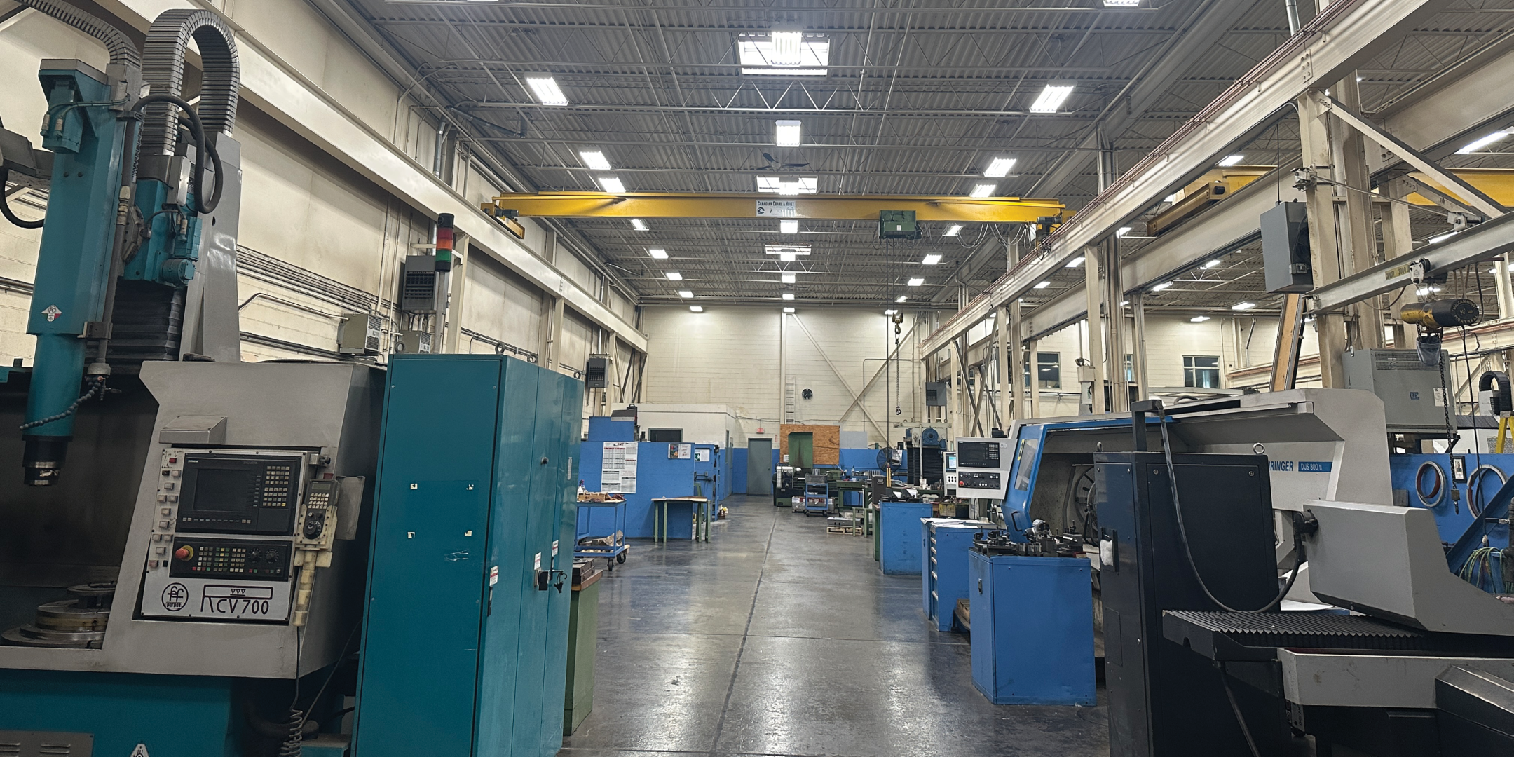 51 Four Valley Drive Warehouse Area with yellow cranes and machines