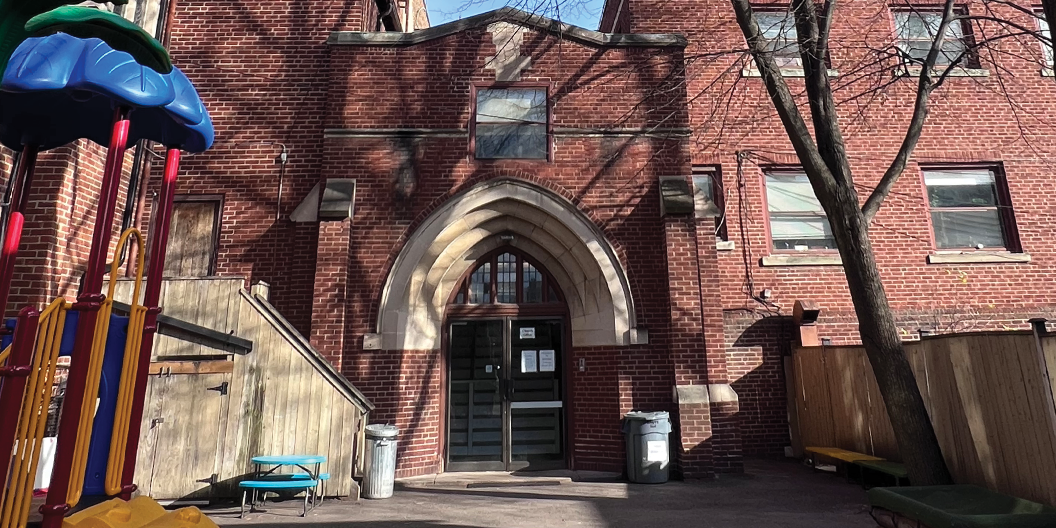 611 St. Clair Avenue W exterior view of the building front door