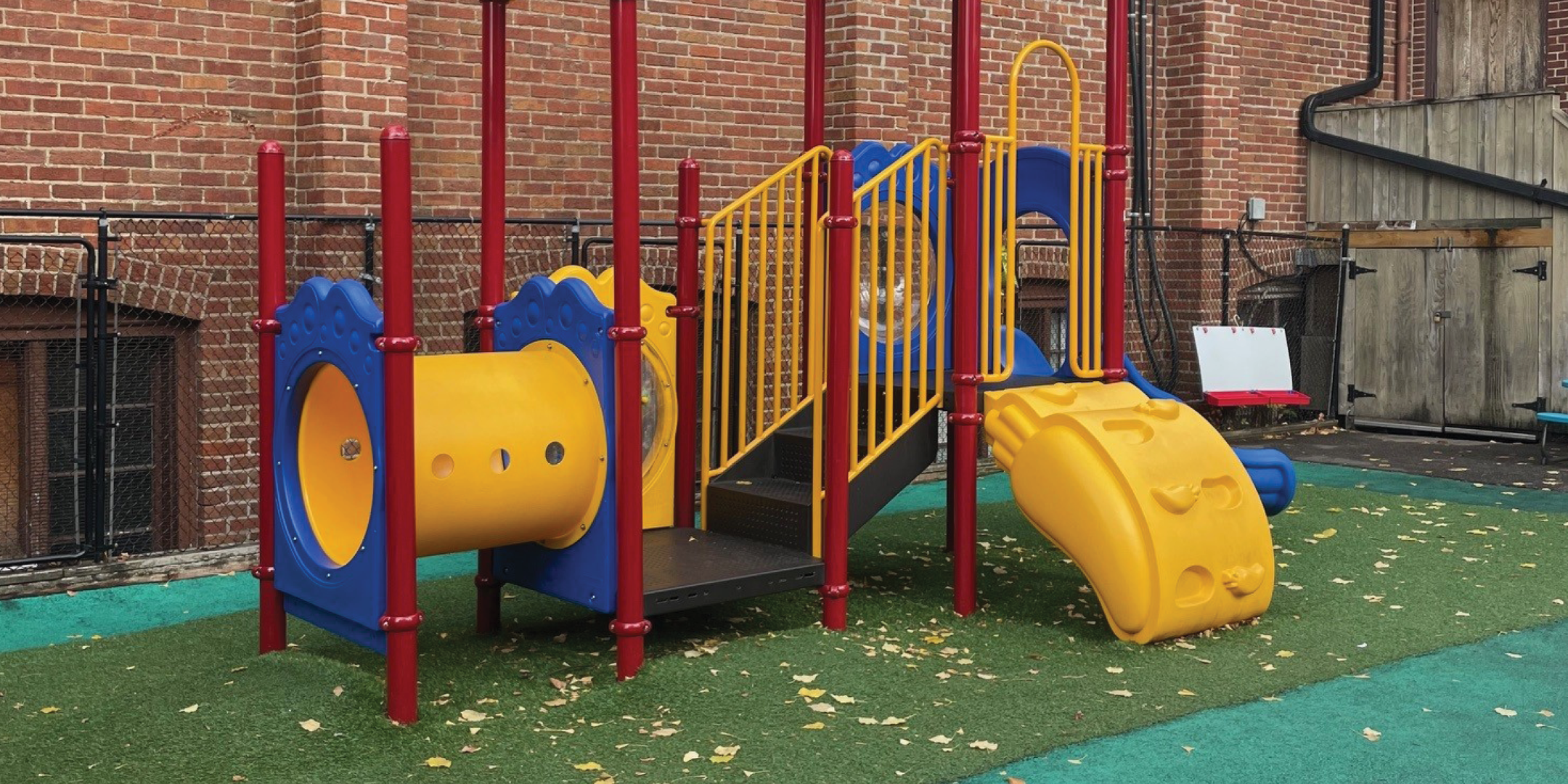 611 St. Clair Avenue W jungle gym outside of the building
