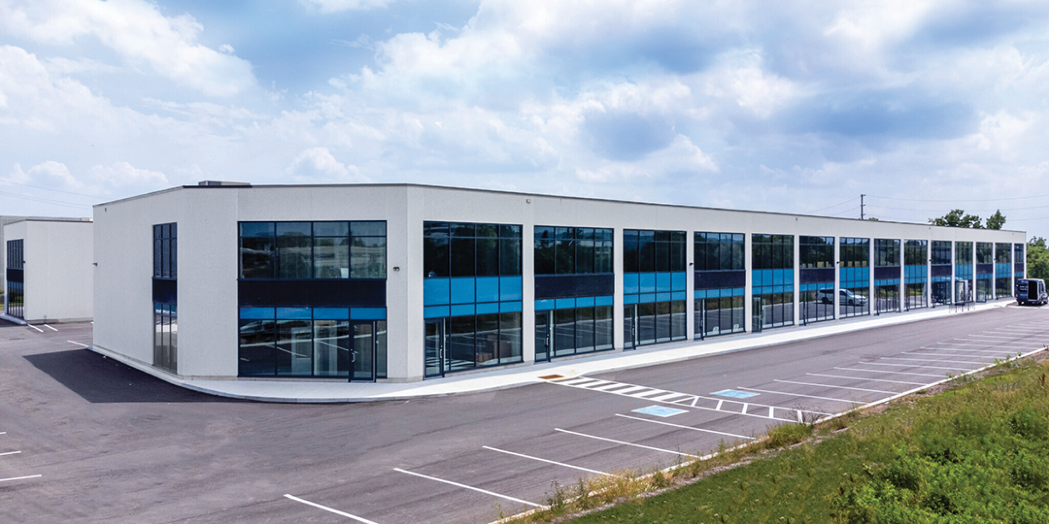 760 Laurentian Drive Building with ample parking