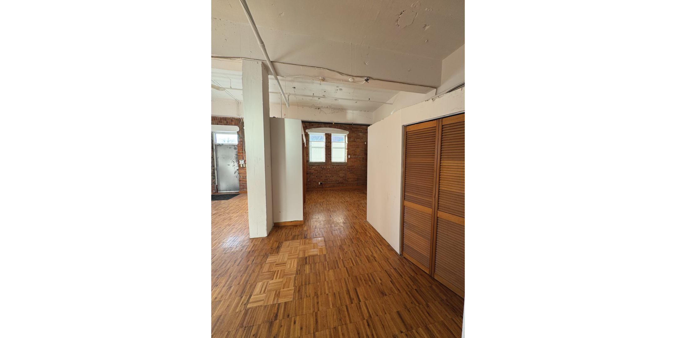 1 Whiltshire Avenue Building Interior Open Area with hardwood floors