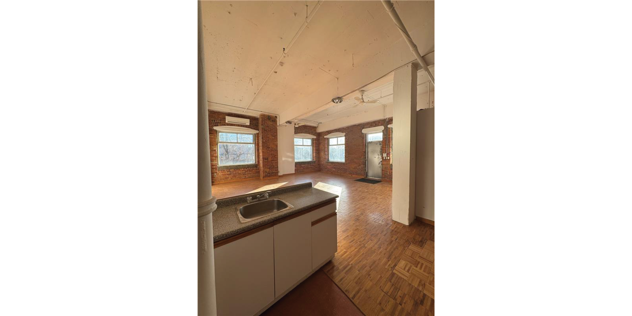 1 Whiltshire Avenue Building Interior with kitchen sink and hardwood floors