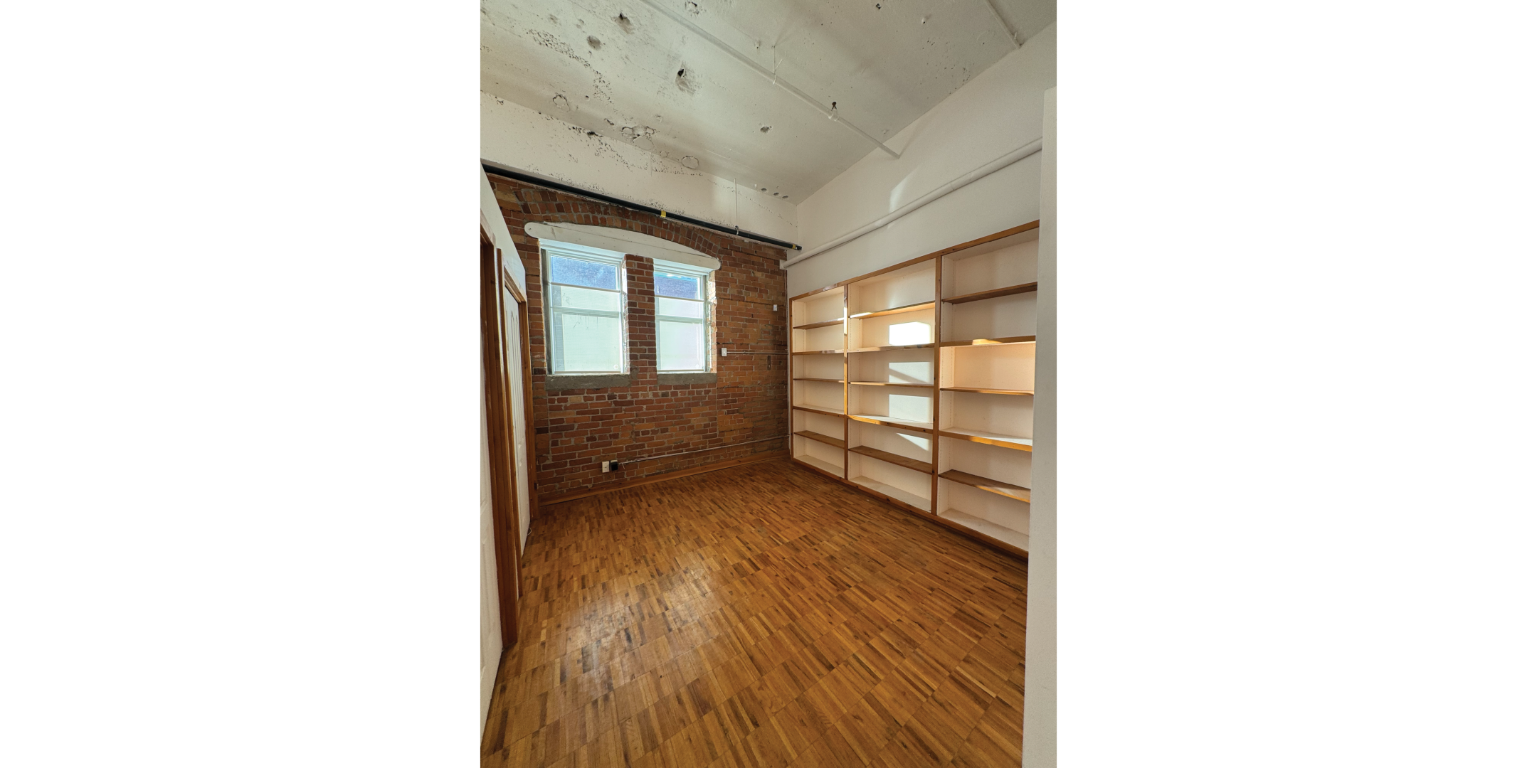 1 Whiltshire Avenue Building Interior Open Area with hardwood floors