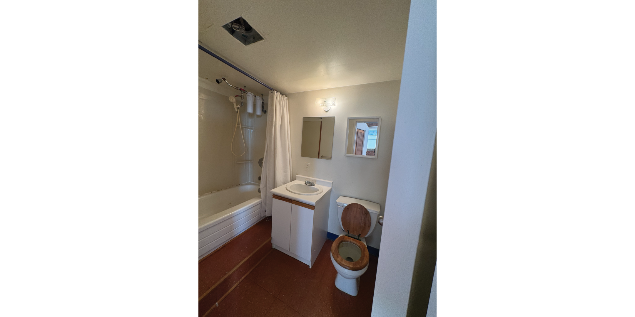 1 Whiltshire Avenue Bathroom with toilet and vanity sink